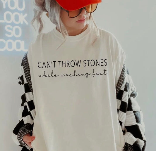 throw stones while washing fee tee