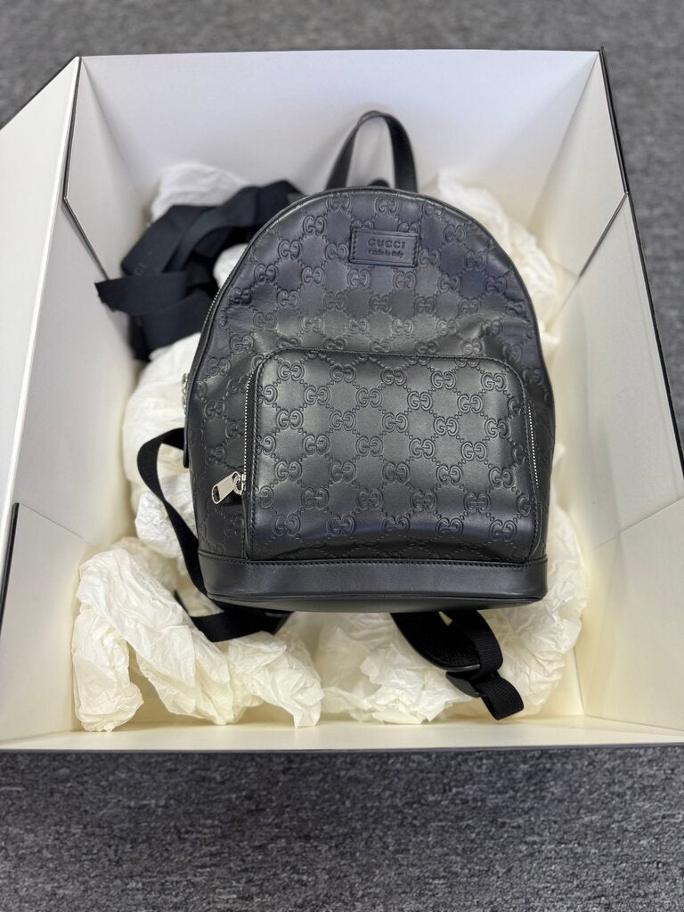 Authentic Gucci Signature leather backpack