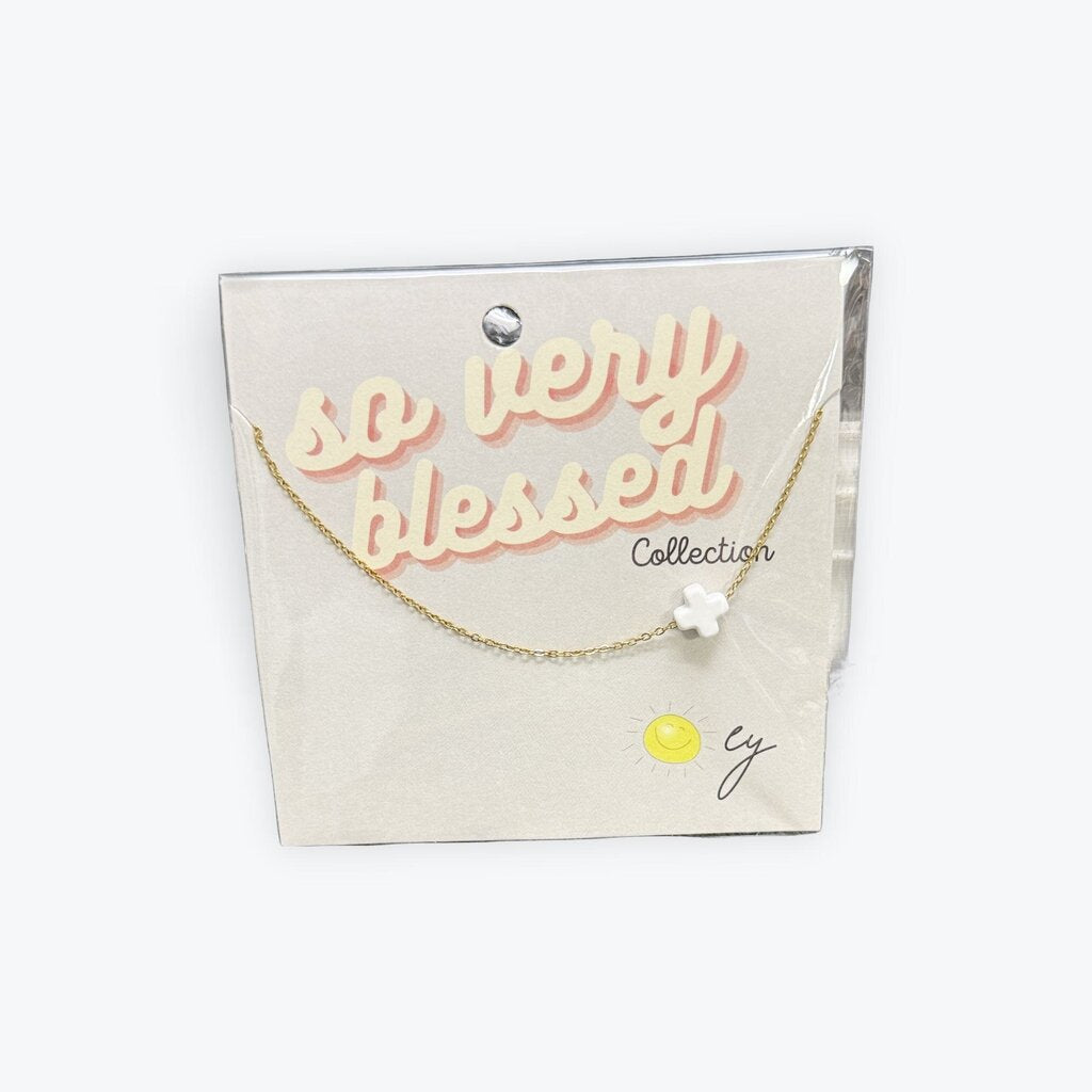 Ellison and Young cross necklace