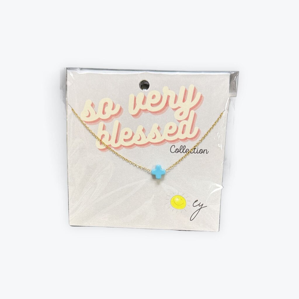 Ellison and Young cross necklace