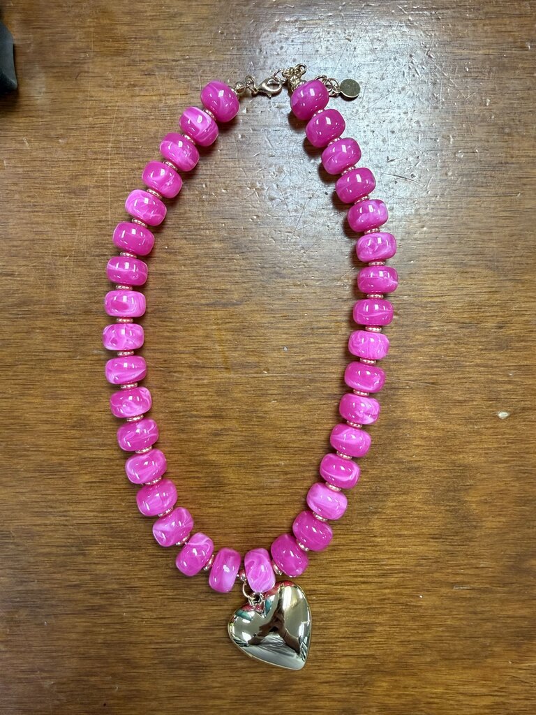 pink beaded necklace with heart