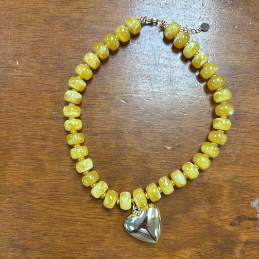 yellow beaded necklace with heart