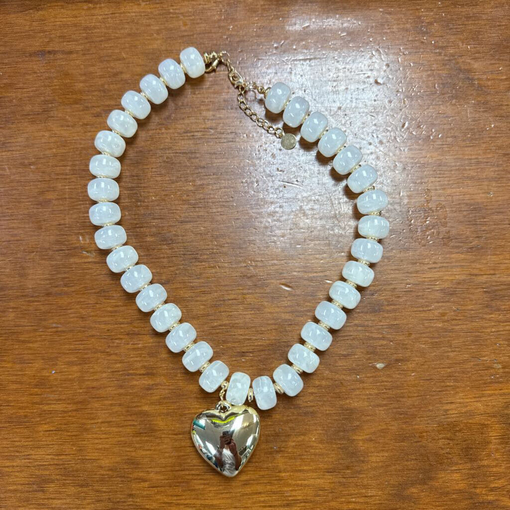 white beaded necklace with heart